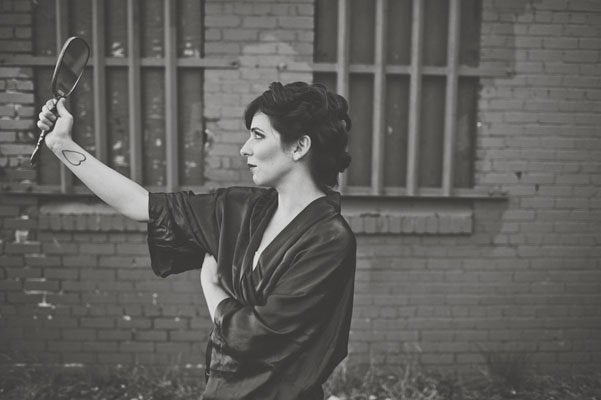 Gaze into the enchanted mirror to see your "beast" before the wedding. <em>Related: <a href="http://www.bridalguide.com/planning/first-look-photos" target="_blank" role="link" rel="nofollow" class=" js-entry-link cet-external-link" data-vars-item-name="75 Reasons to Have a First Look" data-vars-item-type="text" data-vars-unit-name="58c0aaaee4b0a797c1d398f0" data-vars-unit-type="buzz_body" data-vars-target-content-id="http://www.bridalguide.com/planning/first-look-photos" data-vars-target-content-type="url" data-vars-type="web_external_link" data-vars-subunit-name="article_body" data-vars-subunit-type="component" data-vars-position-in-subunit="7">75 Reasons to Have a First Look</a></em>