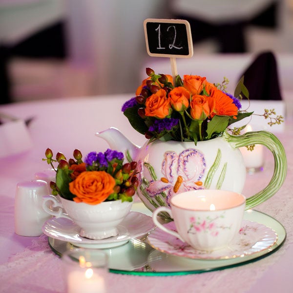 A pretty tea set makes a perfectly charming centerpiece. <em>Related: <a href="http://www.bridalguide.com/planning/the-details/theme/vintage-wedding-ideas" target="_blank" role="link" rel="nofollow" class=" js-entry-link cet-external-link" data-vars-item-name="50 Ideas for a Vintage-Inspired Wedding" data-vars-item-type="text" data-vars-unit-name="58c0aaaee4b0a797c1d398f0" data-vars-unit-type="buzz_body" data-vars-target-content-id="http://www.bridalguide.com/planning/the-details/theme/vintage-wedding-ideas" data-vars-target-content-type="url" data-vars-type="web_external_link" data-vars-subunit-name="article_body" data-vars-subunit-type="component" data-vars-position-in-subunit="17">50 Ideas for a Vintage-Inspired Wedding</a></em>