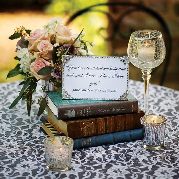 Frame a love quote from a classic novel on each table. Related: 30 Heartwarming Wedding Readings From Books