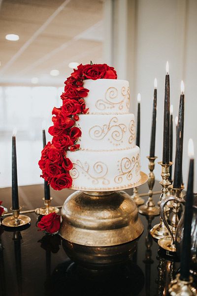 Or, give your cake a more subtle nod to Beauty and the Beast with a red rose cascade. Related: 101 Amazing Wedding Cakes