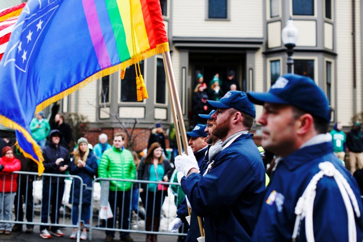 The color guard for LGBTQ veterans group OUTVETS marches down Broadway during the St. Patrick's Day Parade in South Boston on March 15, 2015. Parade organizers denied the group permission to join the march this year.