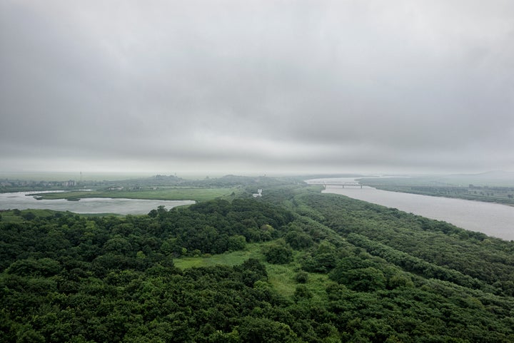 The park will be located in the Chinese provinces of Heilongjiang and Jilin, the latter of which borders both North Korea and Russia. In this photograph, taken in Jilin's Hunchun area, lands from all three countries can be seen. The land with a lake on the left is Russia, the land in the middle is China, and the right side of the Tumen river is North Korea.