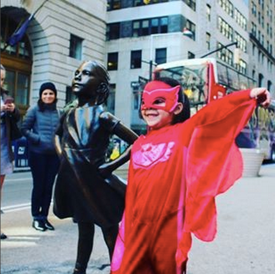 People checking out "The Fearless Girl" statue couldn't get enough of Abrianna and took photos of her.