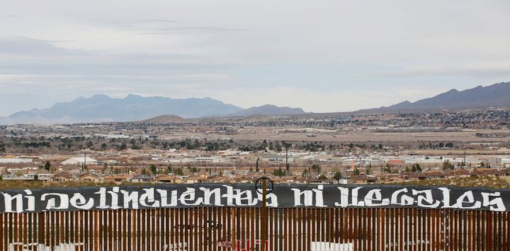‘Neither criminals nor illegals’: activists painted the U.S.-Mexico border in protest against US President Donald Trump’s new immigration reform. 
