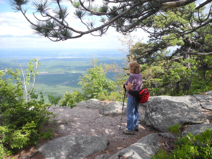<p><em>Taking in the spectacular view along the hike to Sunset Rock, one of eight Hudson River School Art Trail sites in the mid-Hudson Valley of New York.</em></p>