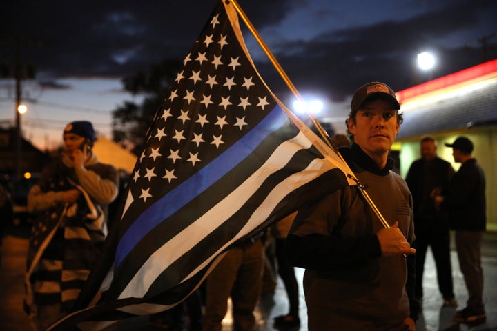 A group supporting Blue Lives Matter gathers in the neighborhood where an off-duty Chicago police officer fatally shot Joshua Beal, a black man, following a road rage incident.