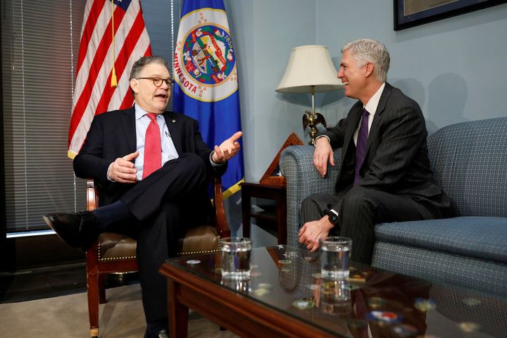 Senator Al Franken (D-MN) speaks with President Donald Trump's Supreme Court nominee Neil Gorsuch at his office on Capitol Hill in Washington March 7, 2017.