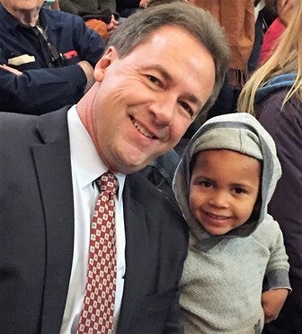 Menny with Montana’s Governor Steve Bullock at a Chanukah Celebration 