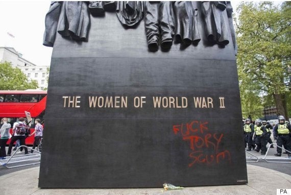 The row erupted after a memorial to the women of the Second World War in Whitehall was daubed with the words 'Fuck Tory scum' during an anti-austerity demonstration