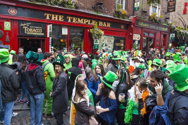DUBLIN, IRELAND - MARCH 17: Saint Patrick's Day parade in Dublin Ireland on March 17, 2014: People dress up Saint Patrick's at The Temple Bar