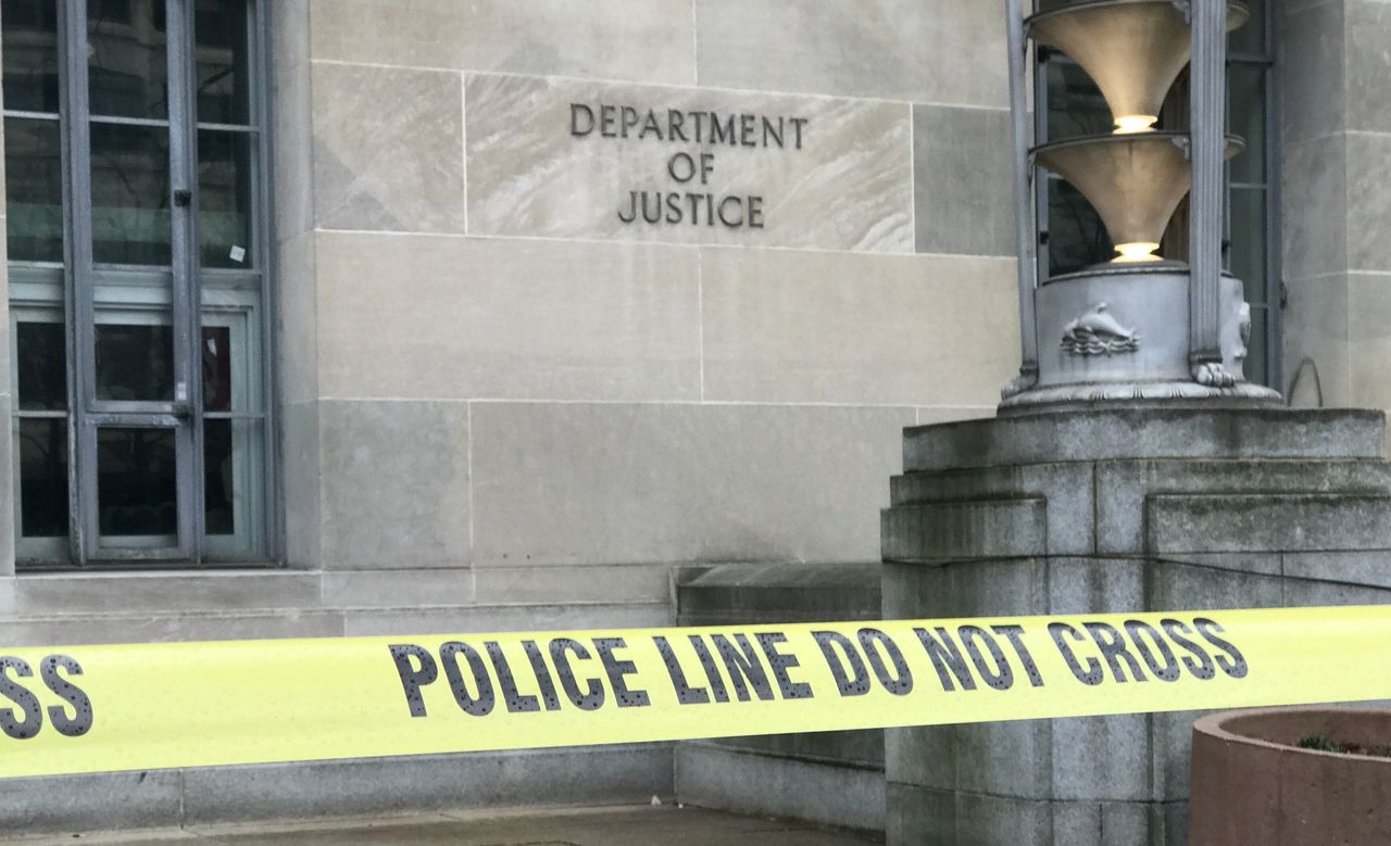 Police tape surrounds the Department of Justice during President Donald Trump's inauguration.