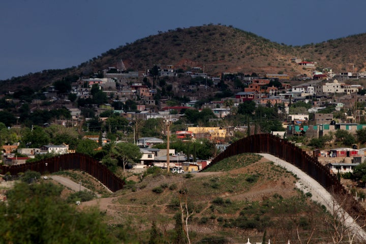 The U.S.-Mexico border wall is shown on July 8, 2012, in Nogales, Arizona. Several hundred miles' worth of barriers already s