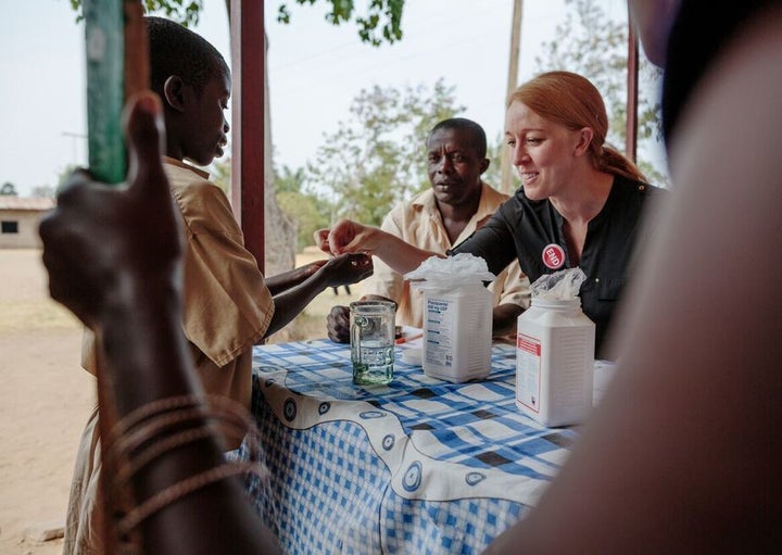 Ellen Agler during a school-based mass drug administration for intestinal worms and schistosomiasis in Burundi.