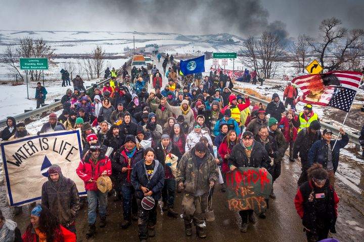 An hour prior to the deadline, a ceremonial exit of Oceti Sakowin. In December, some estimates were well over 10,000 people who were inside the camp.