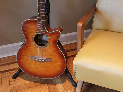 His guitar collection includes an acoustic Ibanez.