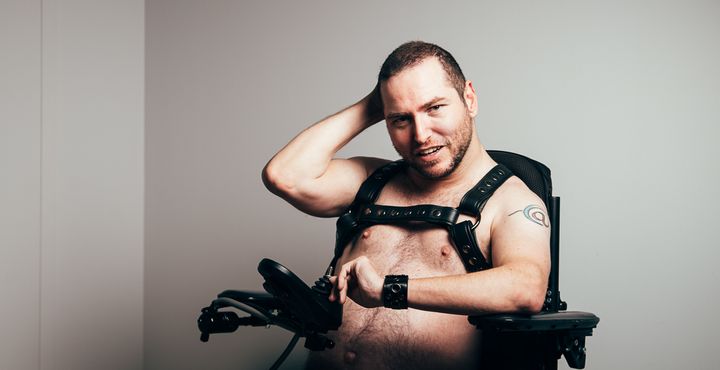 Andrew Gurza wearing a harness.