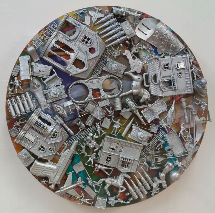 Margaret Roleke, War Life (2015), lenticular collage with painted plastic toys on wood structure, 24 inches diameter by 8 inches deep 