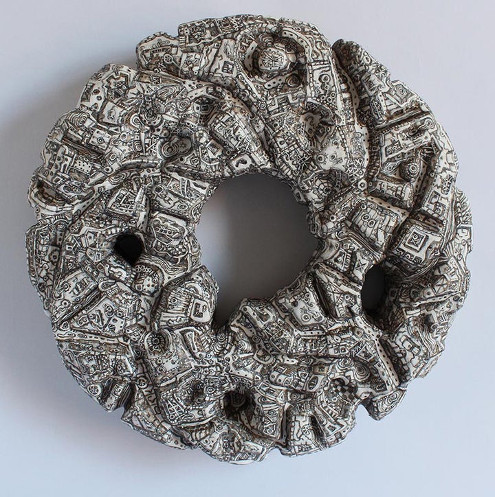 Alexis Duque, Disk (2015), polystyrene foam, resin, ink and acrylic paint, 16 inches in diameter by 3 inches deep