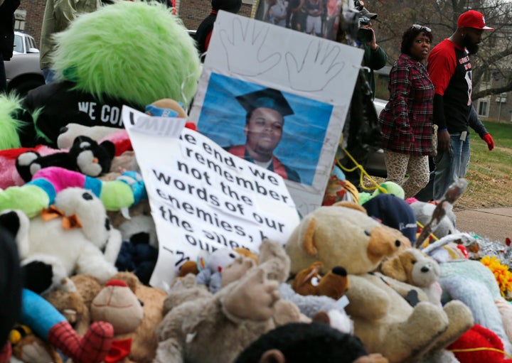 Michael Brown Sr. walks past the memorial set up where his son Michael Brown was shot and killed in Ferguson, Missouri, Nov. 22, 2014.