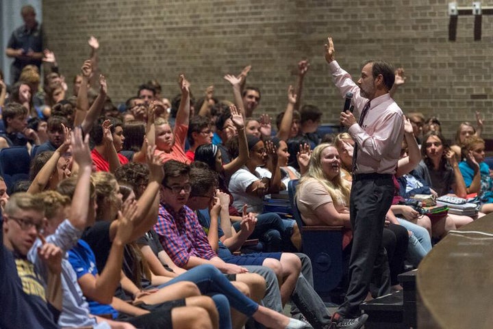 Joel Feldman working with high school teens