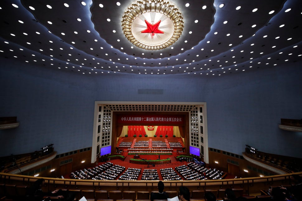 Delegates attend the National People's Congress at the Great Hall of the People on March 12, 2017 in Beijing.