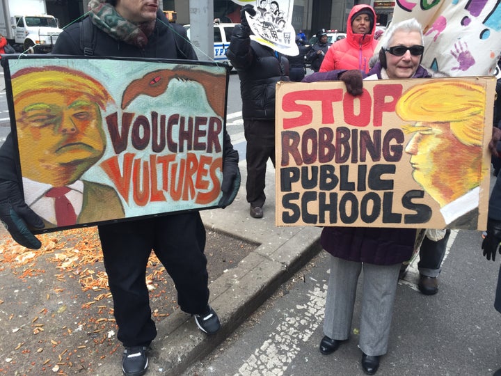 New York City protest against Trump voucher plan.