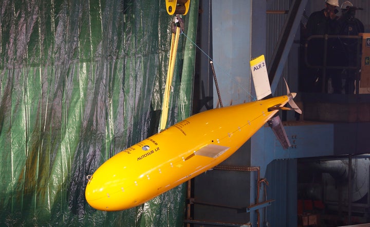 The unmanned submersible known as "Boaty McBoatface" is seen hanging from a crane in northern England. The vessel will probe the Southern Ocean's water flow and turbulence.