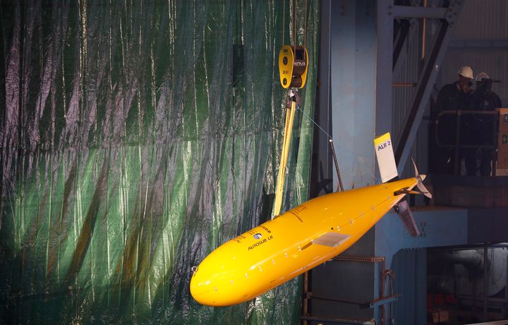 The unmanned submersible known as "Boaty McBoatface" is seen hanging from a crane in northern England. The vessel will probe the Southern Ocean's water flow and turbulence.