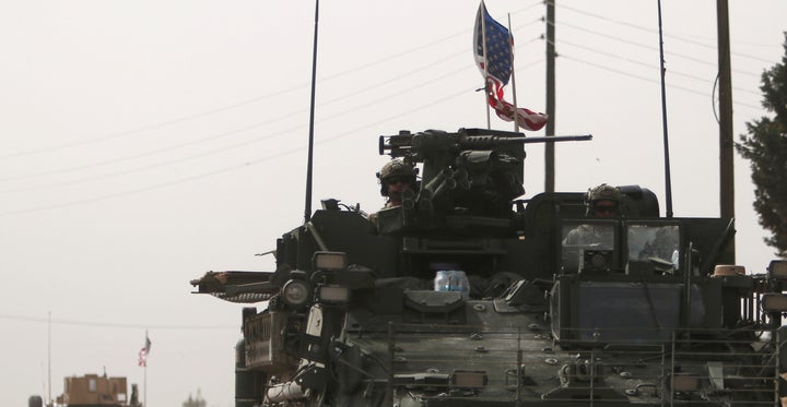 American army vehicles drive north of Manbij city, in Aleppo Governorate, Syria March 9, 2017.