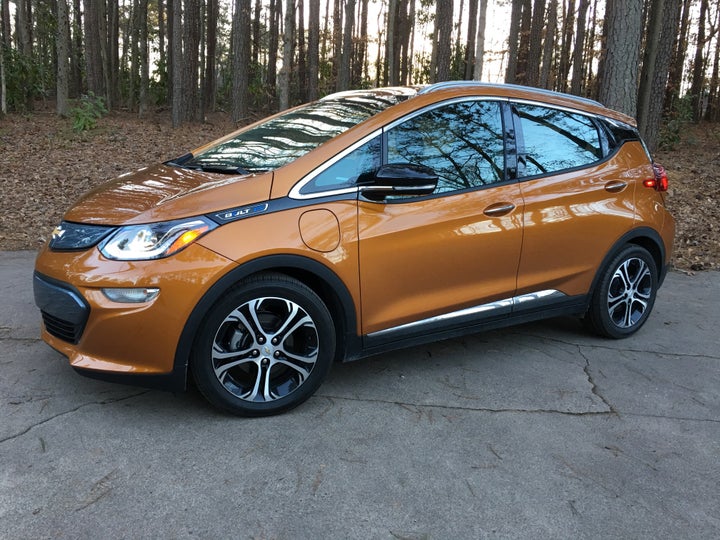 <p>2017 Chevrolet Bolt Premier in Orange Burst Metallic side view</p>