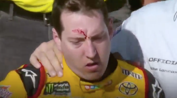 NASCAR driver Kyle Busch was left with a bloody gash on his forehead following a brawl at the Las Vegas Motor Speedway on Sunday.