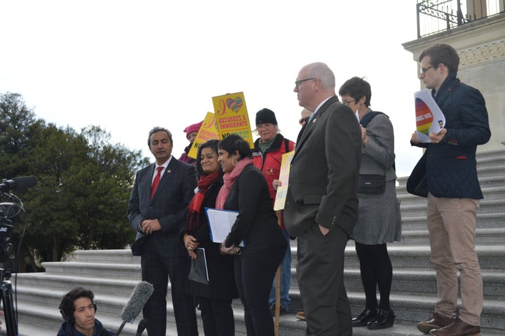 Activists and politicians gather on the steps of the Capitol in Washington D.C., on Friday for a vigil to honor victims of hate violence.