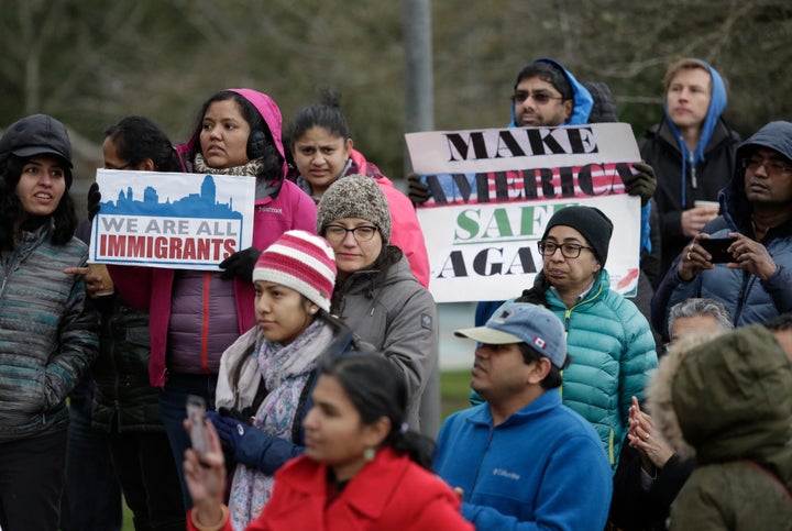 Members of the South Asian community and others attend a peace vigil for Srinivas Kuchibhotla, the 32-year-old Indian engineer killed at a bar Olathe, Kansas, in Bellevue, Washington on March 5, 2017.