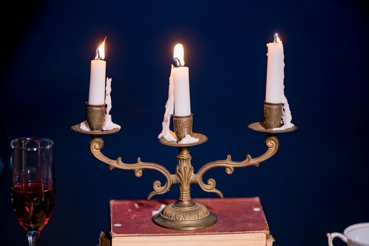 The candelabra is a nod to the character Lumiere from the 1991 movie. 