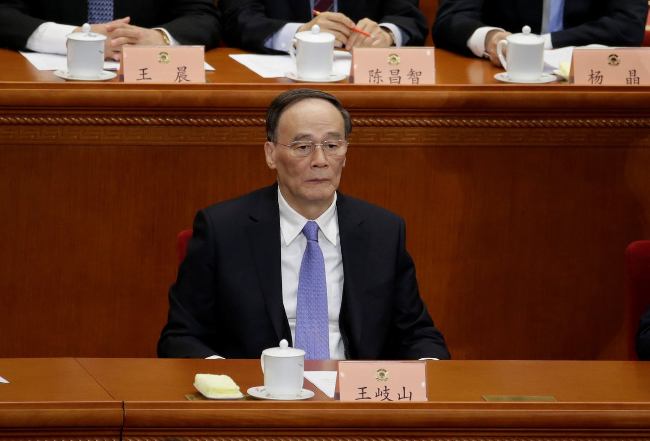 China's Politburo Standing Committee member Wang Qishan at the CCPPCC opening session in Beijing.