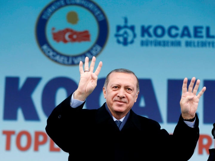 Turkish President Recep Tayyip Erdogan greets a crowd in Kocaeli, Turkey, on March 12, 2017.