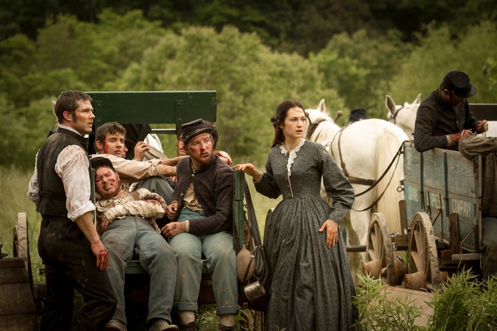 <p>Emma Green (Hannah James), right, in a strikingly courageous moment on the battlefield. </p>