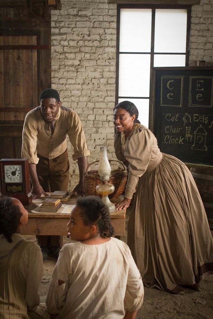 <p>Samuel Diggs and Charlotte Jenkins at a class teaching black children to read and write.</p>