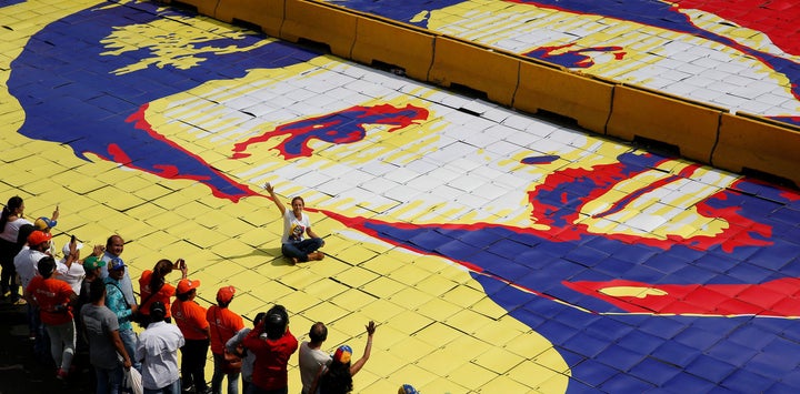 The wife of a jailed opposition leader, during a rally to mark the third anniversary of his arrest in Caracas, Venezuela. 