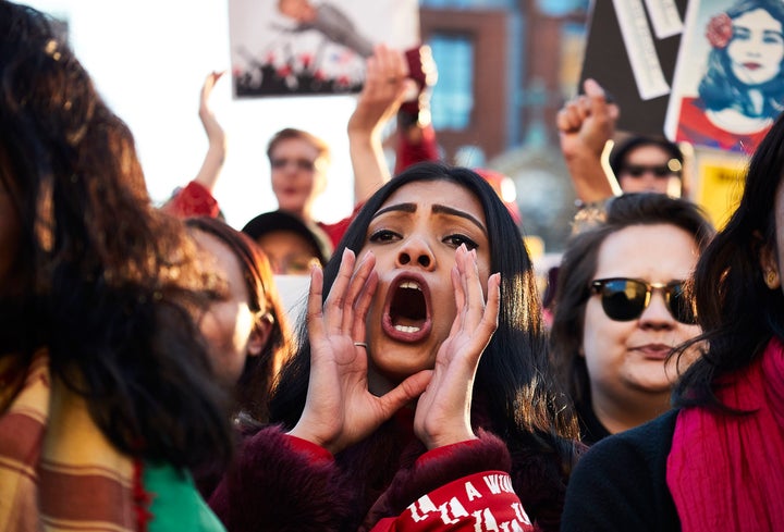 Women rally in New York's Washington Square Park for a Day Without A Woman o March 8. 