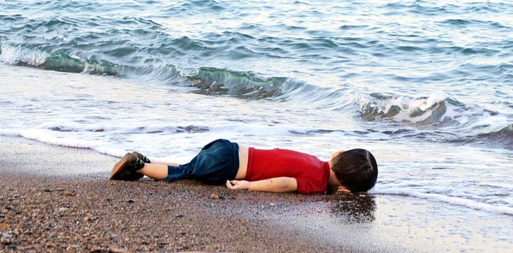 The body of Aylan Kurdi lies on the shores in Bodrum, southern Turkey, on September 2, 2015.