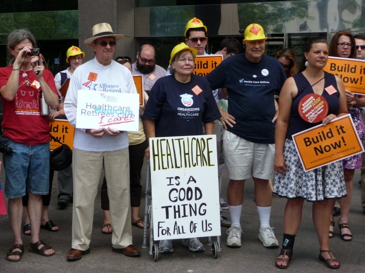 <p>Ohioans rally in the state capital of Columbus in 2012 in support of healthcare for everyone.</p>