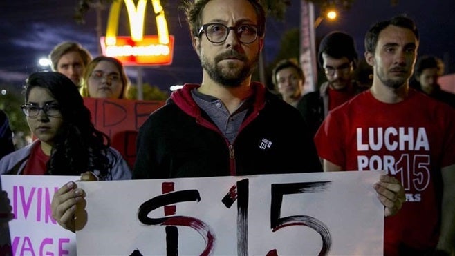 <p>A demonstration in support of striking fast-food workers at a McDonald's restaurant in Austin, Texas. The parent companies of large chains don’t want to be responsible for the wage and hour and antidiscrimination complaints of workers in individual franchises.</p>