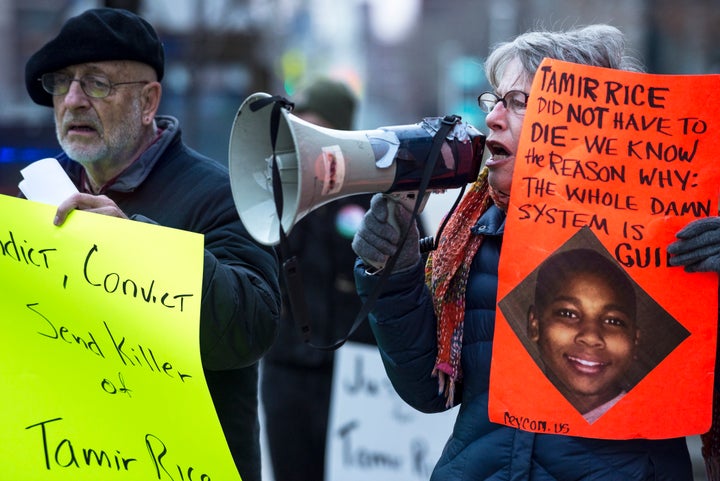 Protesters gather outside of City Hall to protest the death of 12-year old Tamir Rice in Cleveland, Ohio, on November 26. Ric