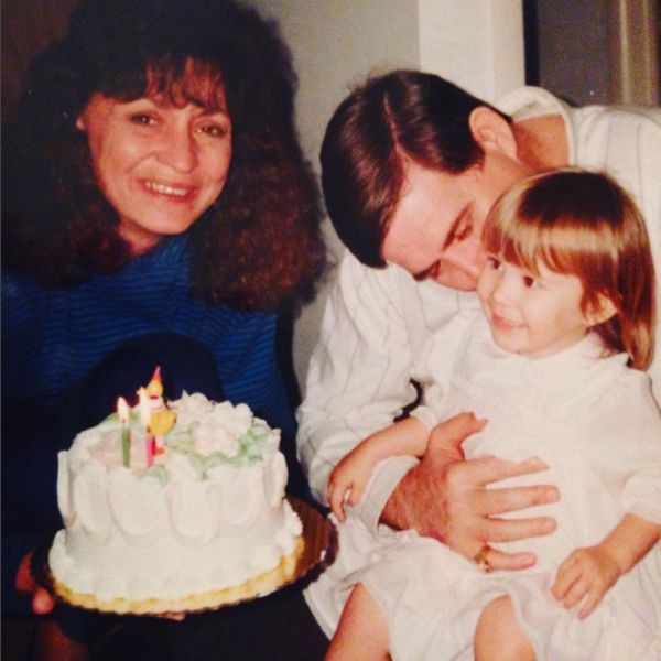 With my parents on my first birthday. 