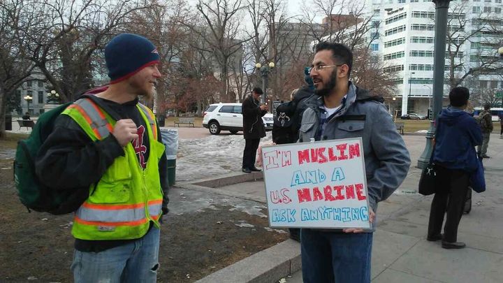 Mansoor Shams with his sign in Denver, January 2017.