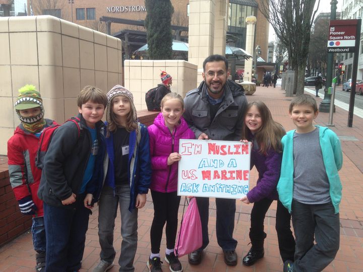 Mansoor Shams with his sign in Portland, January 2017. 