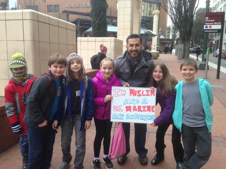 Mansoor Shams with his sign in Portland, January 2017.