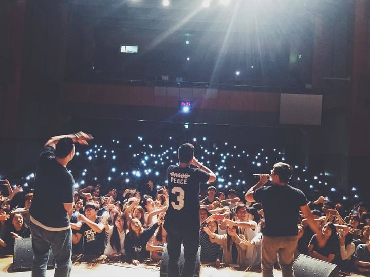 Hip-hop group <em>AMP (Left </em>- CL; Middle - J. Han; Right - Sam Ock), performing for an audience of 750 at Handong Global