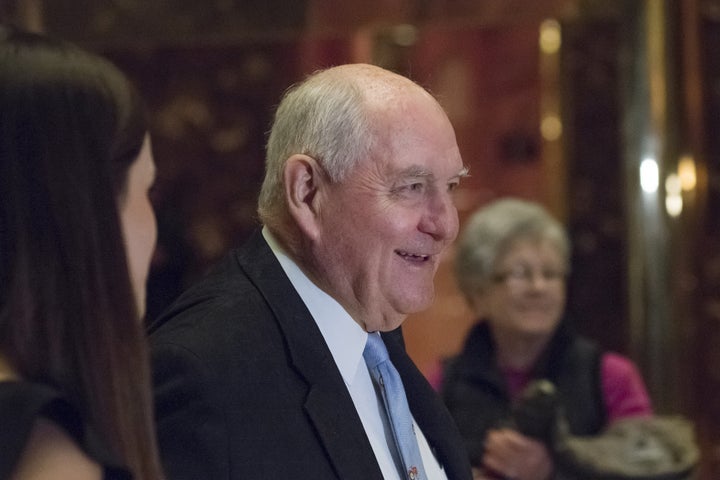 Sonny Perdue arrives at Trump Tower in New York on Nov. 30. Recent reports have detailed serious ethical issues dating back t